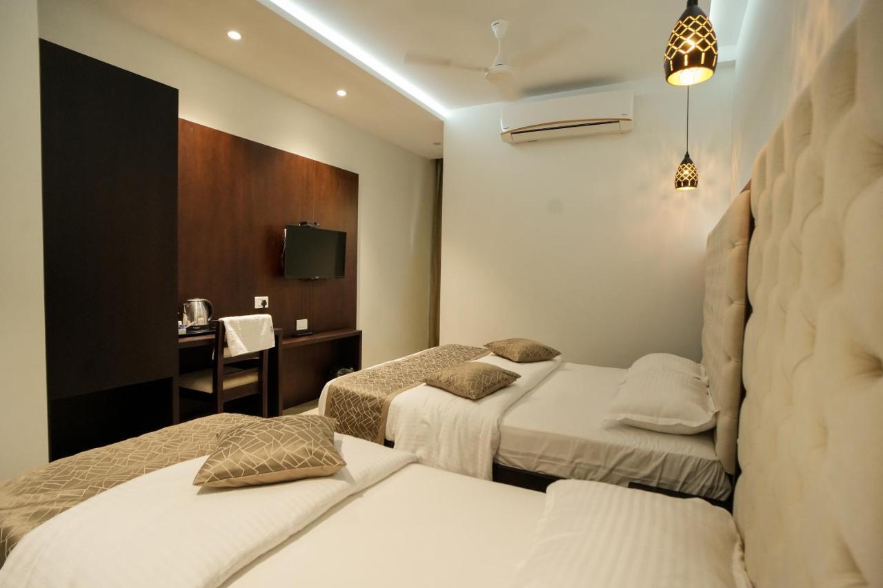Hotel Sulu Residency à Kochi Extérieur photo