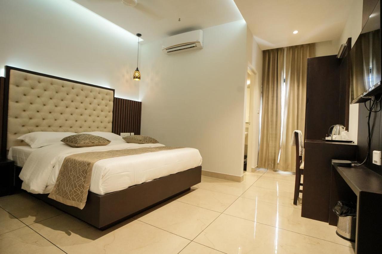 Hotel Sulu Residency à Kochi Extérieur photo