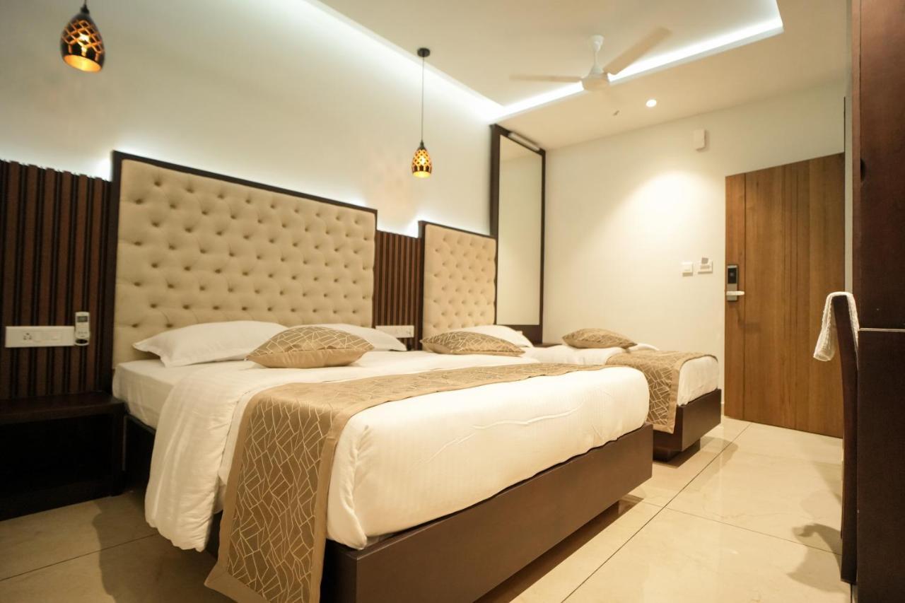 Hotel Sulu Residency à Kochi Extérieur photo